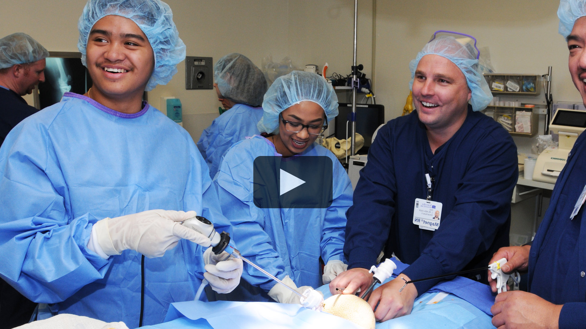 A group of two high school students and their nurse mentors learning about laparoscopic surgery about NorthBay Healthcare's Nurse Camp.